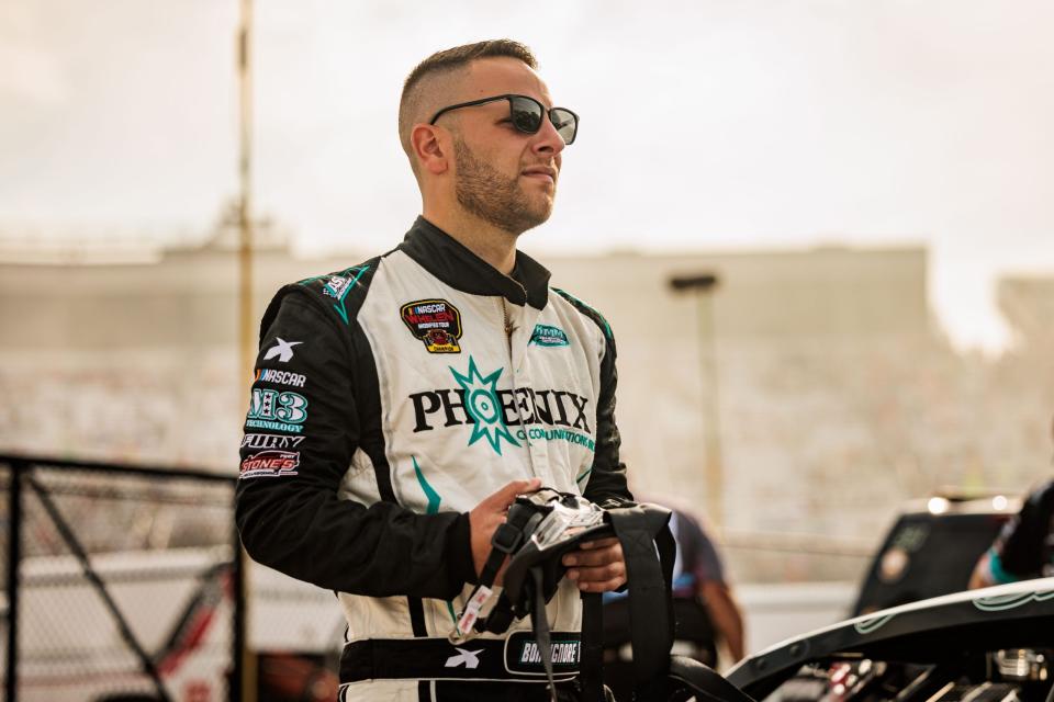 Justin Bonsignore driver of the #51 Phoenix Communications FURY Race car looks on during the Whelen 100 for the Whelen Modified Tour at New Hampshire Motor Speedway on July 16, 2022 in Loudon, New Hampshire. (Nick Grace/NASCAR)