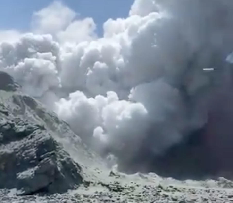 Smoke billows from White Island, in the Bay of Plenty, after a volcanic eruption in New Zealand.