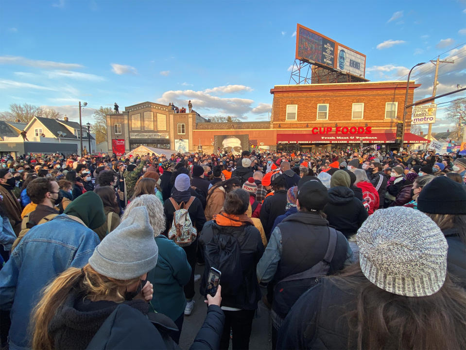 Image: People gather around memorial to George Floyd in Minneapolis (Deon J. Hampton / NBC News)