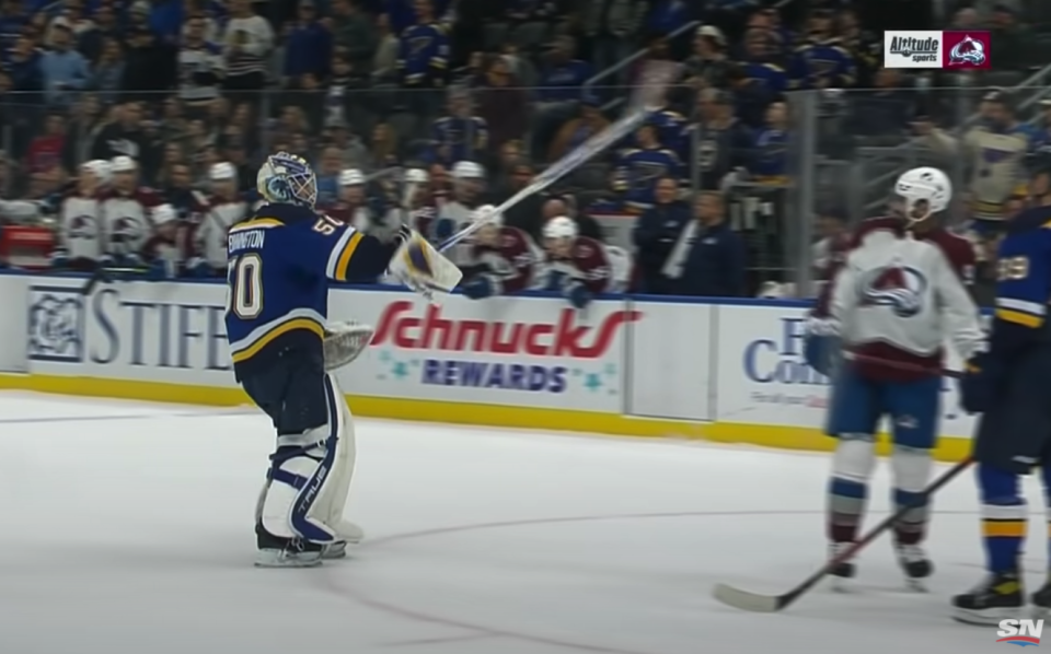 Blues goalie Jordan Binnington somehow suckered Nazem Kadri into a misconduct after swinging his goalie stick at the Avalanche forward's head. (Photo via YouTube/Sportsnet)