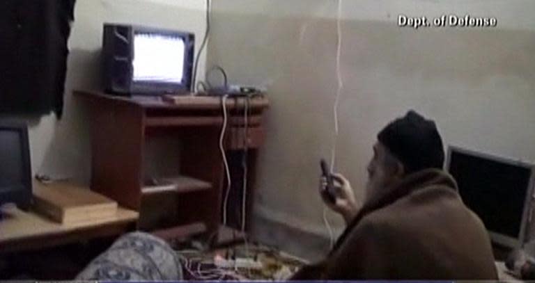 This image grab from an undated video released by the US Department of Defence on May 7, 2011 reportedly shows Al-Qaeda leader Osama bin Laden watching television at his compound in Abbottabad, Pakistan