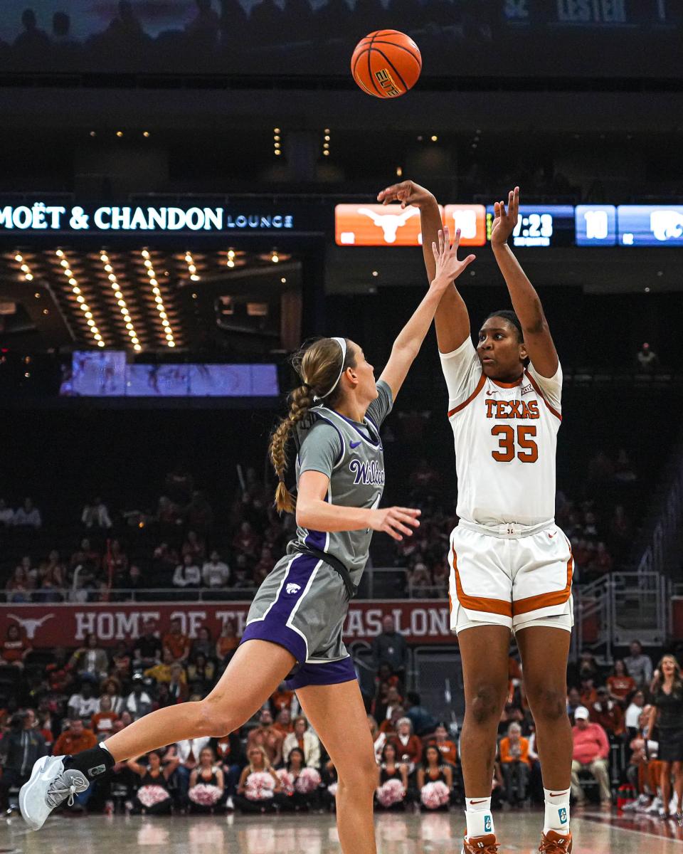 Texas guard Madison Booker gets off a shot against Kansas State guard Serena Sundell during Sunday's game at Moody Center. The Longhorns pulled closer in the Big 12 race with the win over the No. 2-ranked Wildcats.