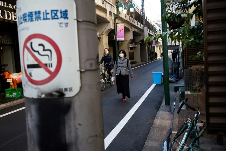 Smoking in the street is already banned in many places in Japan, under local regulations that impose hefty fines on violators