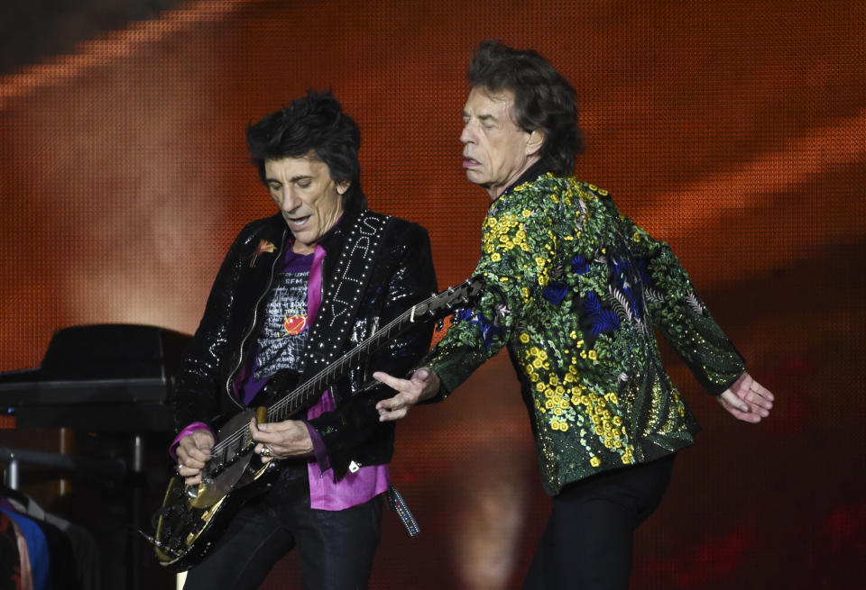 Ron Wood, left, and Mick Jagger of the Rolling Stones perform during the band's concert at the Rose Bowl, Thursday, Aug. 22, 2019, in Pasadena, Calif. (Photo by Chris Pizzello/Invision/AP)