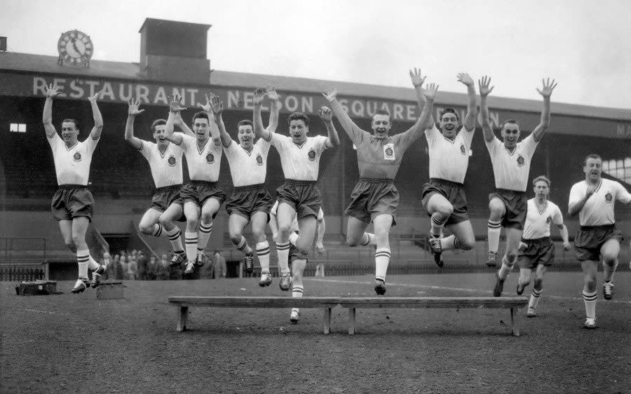 Holden, second right, with his Bolton teammates, including Nat Lofthouse, far left, in the run-up to the 1958 FA Cup final - PA