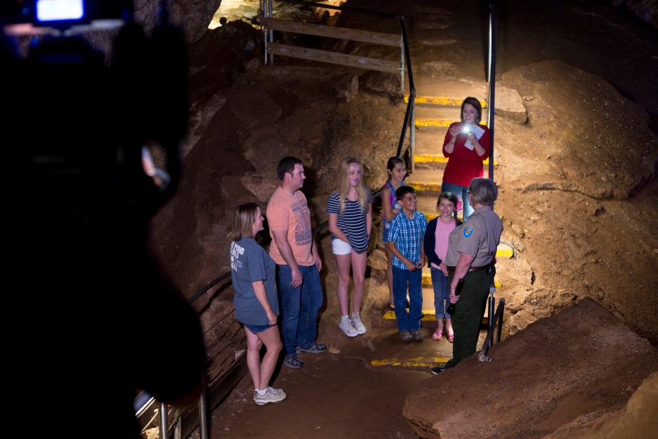 A guide takes a group on a tour at Alabaster Caverns State Park.