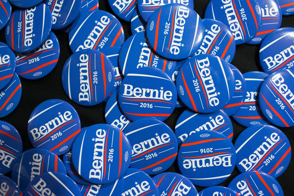 Buttons sit on a table during a campaign event for Sen. Bernie Sanders at Drake University on June 12, 2015 in Des Moines, Iowa.