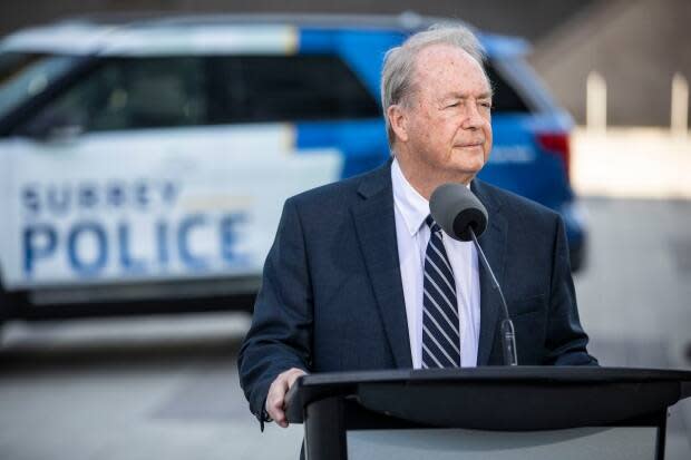 Surrey mayor Doug McCallum has said in the past that the actual referendum was the last municipal election when he promised to bring in a Surrey police force. He is pictured near a Surrey Police vehicle during his state of the city address on May 7, 2019. 