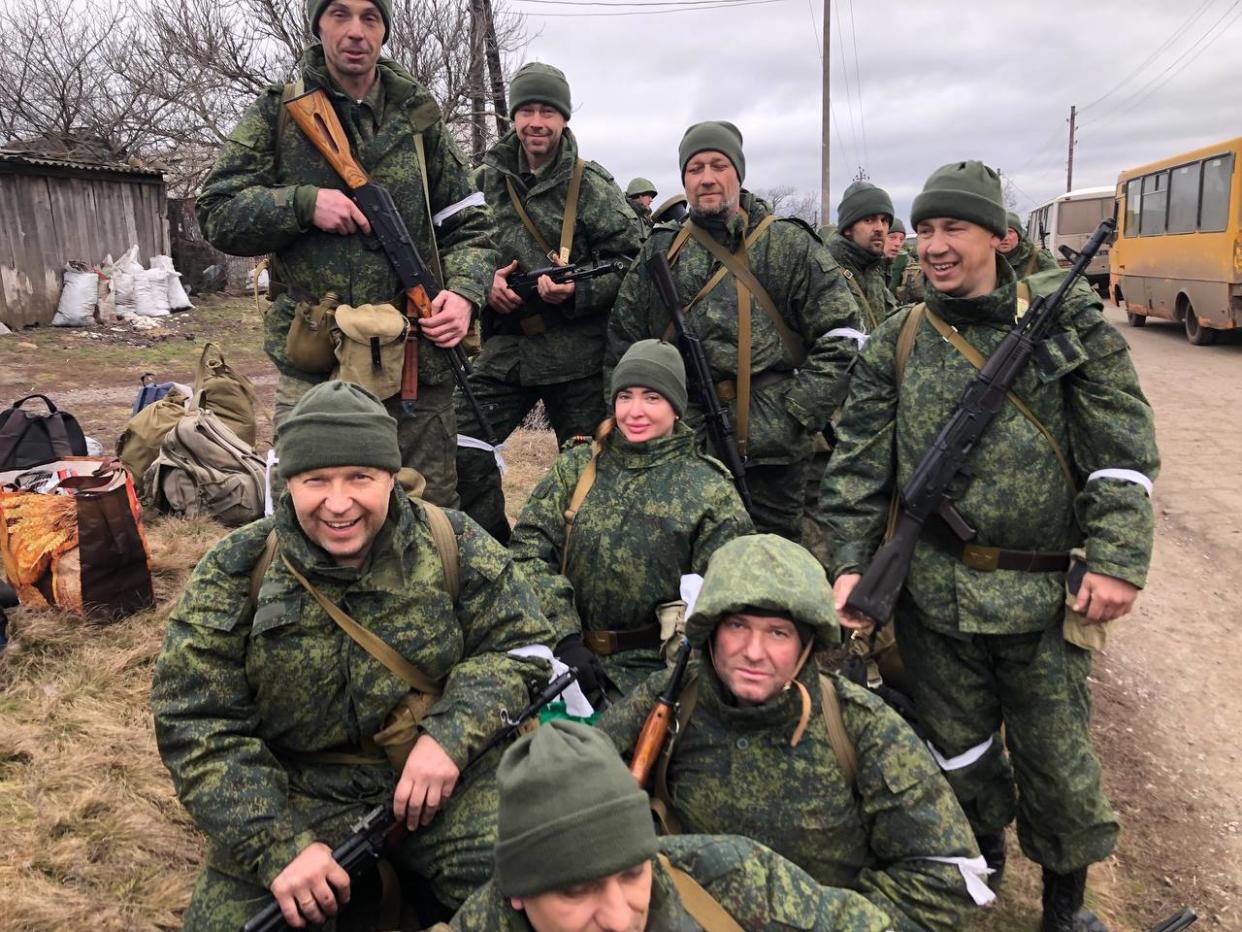 In an undated photo provided by Anna Ilyasova, center, she appears with other pro-Russian fighters from the east of Ukraine. (Anna Ilyasova via The New York Times)