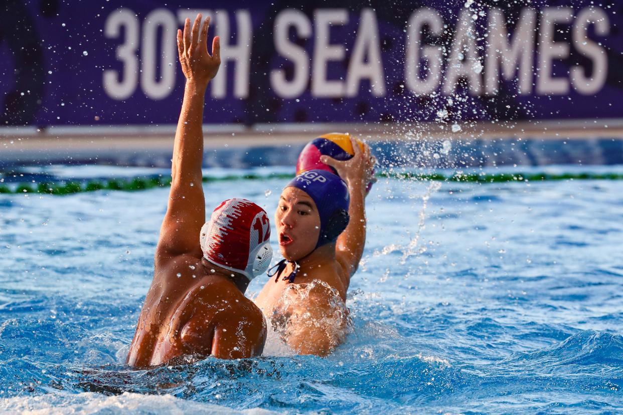 Kun Yang Chiam (blue cap) of Singapore prepares to pass the ball during their match against Indonesia for the water polo event of the 30th SEA Games held at the New Clark City Aquatics Center in Capas town, province of Tarlac, Philippines on November 28, 2019. (Photo by George Calvelo/NurPhoto via Getty Images)