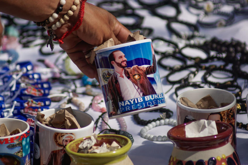 A man sells mugs with the image of President Nayib Bukele, in Sonsonate, El Salvador, on Jan. 27, 2024.<span class="copyright">APHOTOGRAFIA/Getty Images</span>