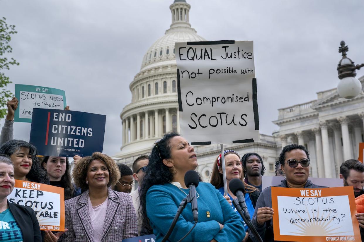 Activists call for ethics reform in the Supreme Court at the U.S. Capitol in Washington on May 2, 2023. <a href="https://newsroom.ap.org/detail/SenateSupremeCourtEthics/0005629d70854888a56e772d5c3fb50b/photo?Query=Clarence%20Thomas&mediaType=photo&sortBy=arrivaldatetime:desc&dateRange=Anytime&totalCount=909&currentItemNo=2" rel="nofollow noopener" target="_blank" data-ylk="slk:AP Photo/J. Scott Applewhite;elm:context_link;itc:0;sec:content-canvas" class="link ">AP Photo/J. Scott Applewhite</a>