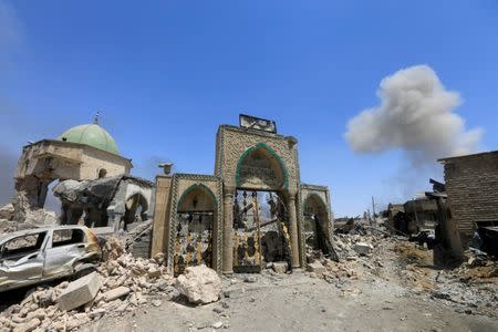 The ruined Grand al-Nuri Mosque is seen after it was retaken by the Iraqi forces from the Islamic State militants at the Old City in Mosul, Iraq, June 30, 2017. REUTERS/Alaa Al-Marjani