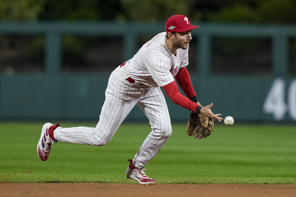 Philadelphia Phillies shortstop Trea Turner throws out Arizona Diamondbacks' Gabriel Moreno at second during the fourth inning in Game 2 of the baseball NL Championship Series in Philadelphia, Tuesday, Oct. 17, 2023. (AP Photo/Brynn Anderson)