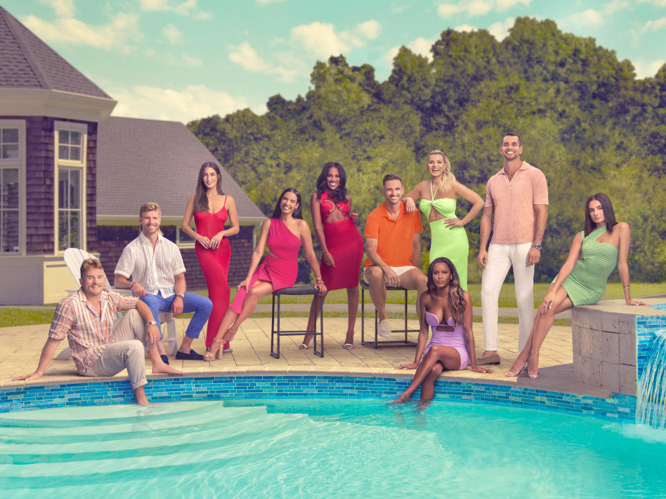 The cast of 'Summer House' Season 8 shown around a pool.