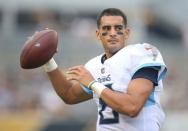 FILE PHOTO: Aug 25, 2018; Pittsburgh, PA, USA; Tennessee Titans quarterback Marcus Mariota (8) warms up on the sidelines against the Pittsburgh Steelers during the second quarter at Heinz Field. Mandatory Credit: Charles LeClaire-USA TODAY Sports/File Photo