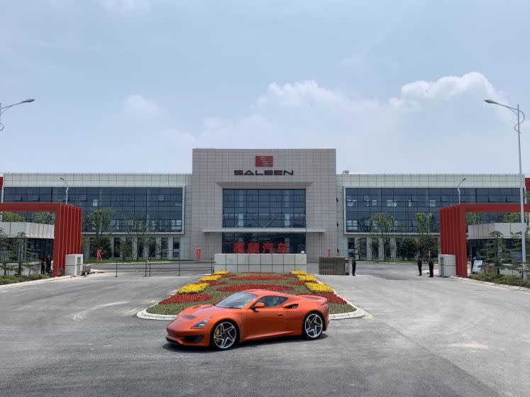 A Saleen-designed sports car is parked at the entrance to the Jiangsu Saleen manufacturing plant in Rugao, China.