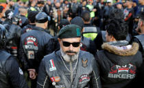 A member of the Iraq Bikers, the first Iraqi biker group, poses for a photograph before riding his motorbike on the streets of Baghdad, Iraq December 28, 2018. REUTERS/Thaier Al-Sudani