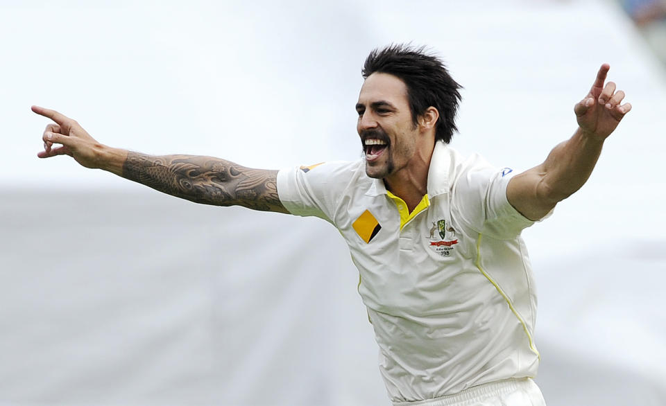 FILE - In this file photo taken Friday, Dec. 27, 2013, Australia's Mitchell Johnson celebrates the wicket of England's Tim Bresnan for 1 run during their Ashes cricket test match at the Melbourne Cricket Ground in Melbourne, Australia. Following a 5-0 Ashes destruction of England, the Australians are playing up their chances of beating top-ranked South Africa in a highly-anticipated three-test series that starts Wednesday at SuperSport Park in Centurion. (AP Photo/Andy Brownbill, File)