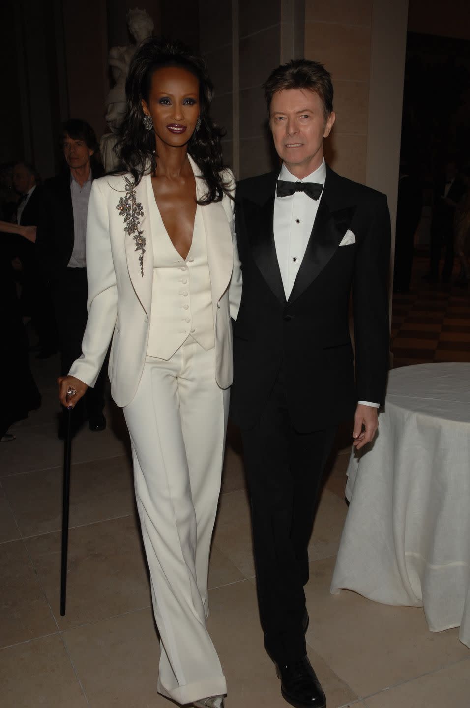 model iman, left, and musician david bowie attend the metropolitan museum of arts annual costume institute gala in new york city iman wears custom stella mccartney and fred leighton jewelry photo by fairchild archivepenske media via getty images
