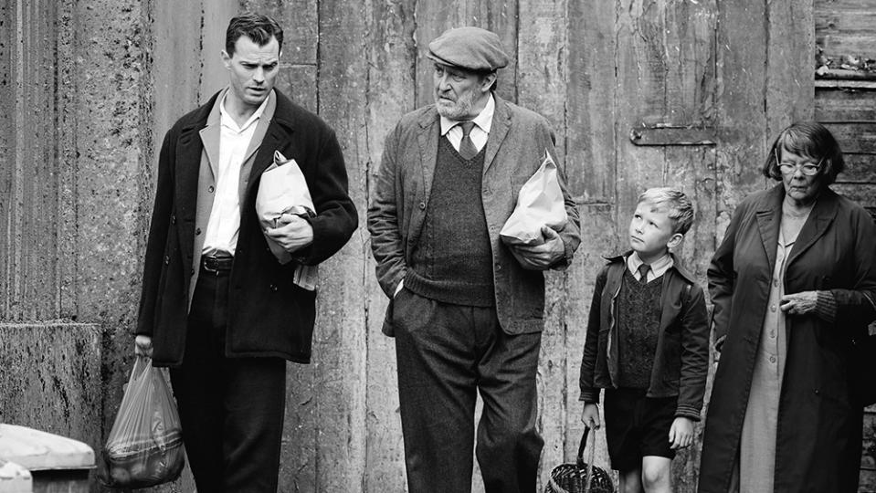 From left: Jamie Dornan, Ciarán Hinds, Jude Hill and Judi Dench in “Belfast” - Credit: Everett