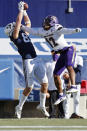 BYU tight end Isaac Rex (83) makes a reception for a touchdown against North Alabama defensive back K.J. Smith (12) in the second quarter during an NCAA college football game Saturday, Nov. 21, 2020, in Provo, Utah. (AP Photo/Jeff Swinger, Pool)