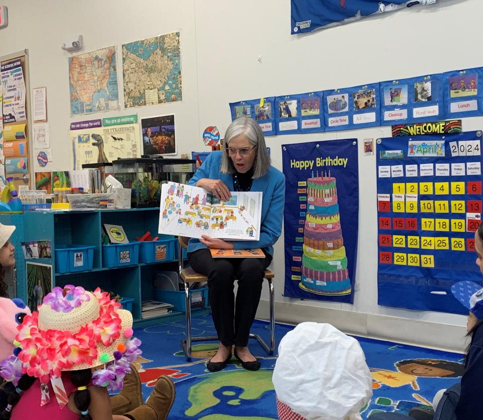 U.S. Rep. Katherine Clark, D-Mass., reads "All Are Welcome," by Alexandra Penfold, to youngsters at the South Middlesex Opportunity Council's (SMOC) child care center on Roxanna Street in Framingham, April 8, 2024.