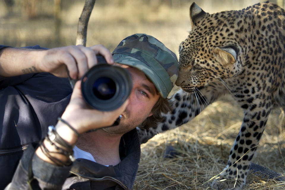 Russell and a leopard get close while in the Tshukudu Game Reserve in South Africa. (Photo: Russell McLaughlin/Caters News)