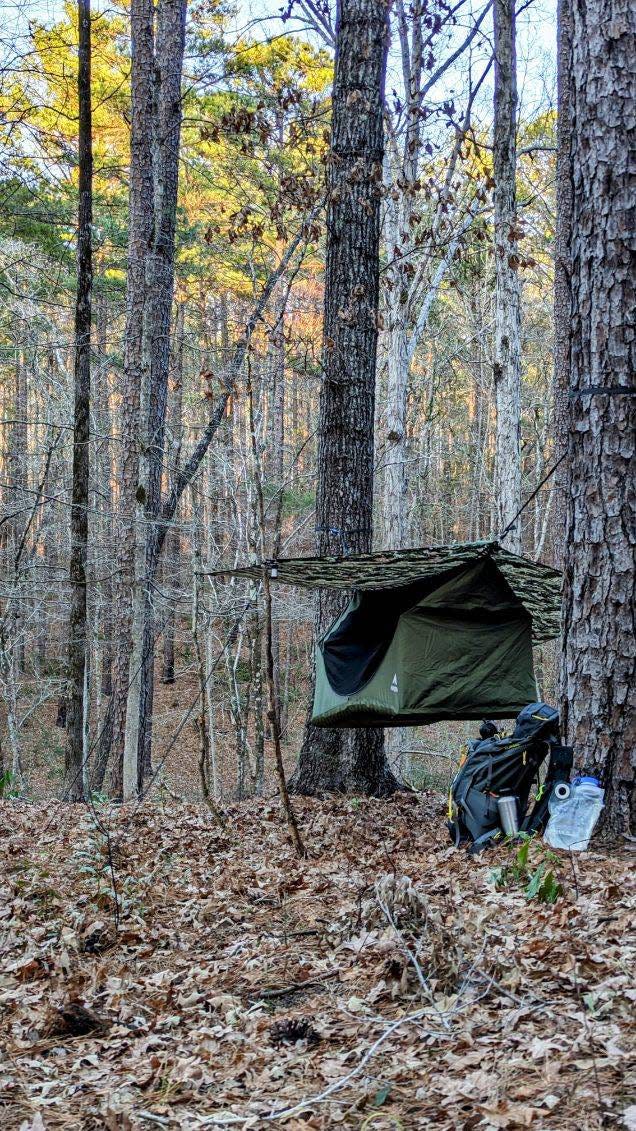 Scott Owens set up his wild campsite in Kisatchie National Forest recently. “To make a wild camping experience aesthetically really good and nice, I look for mature hardwood delineation, topography, elevation and presence of a water source,” said Owens.