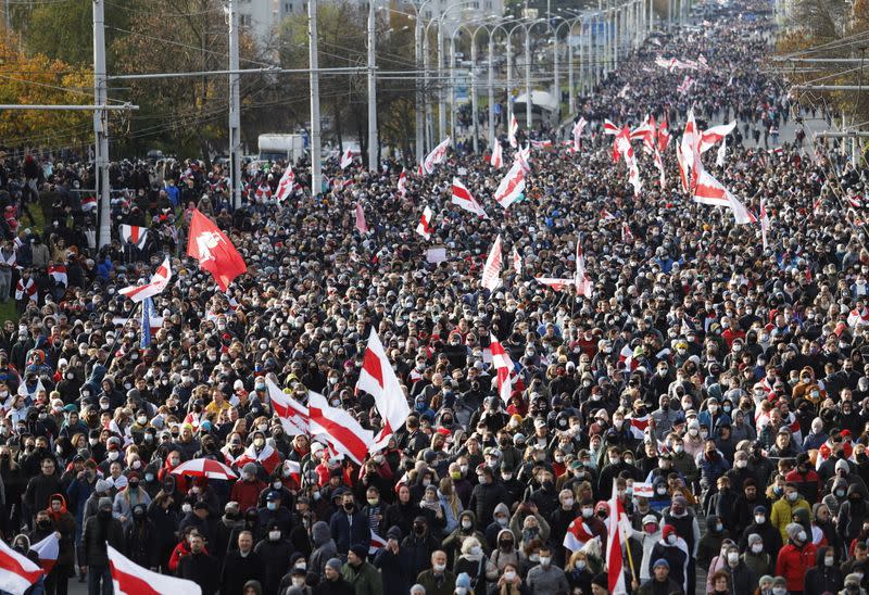 Belarusian opposition supporters hold a rally in Minsk