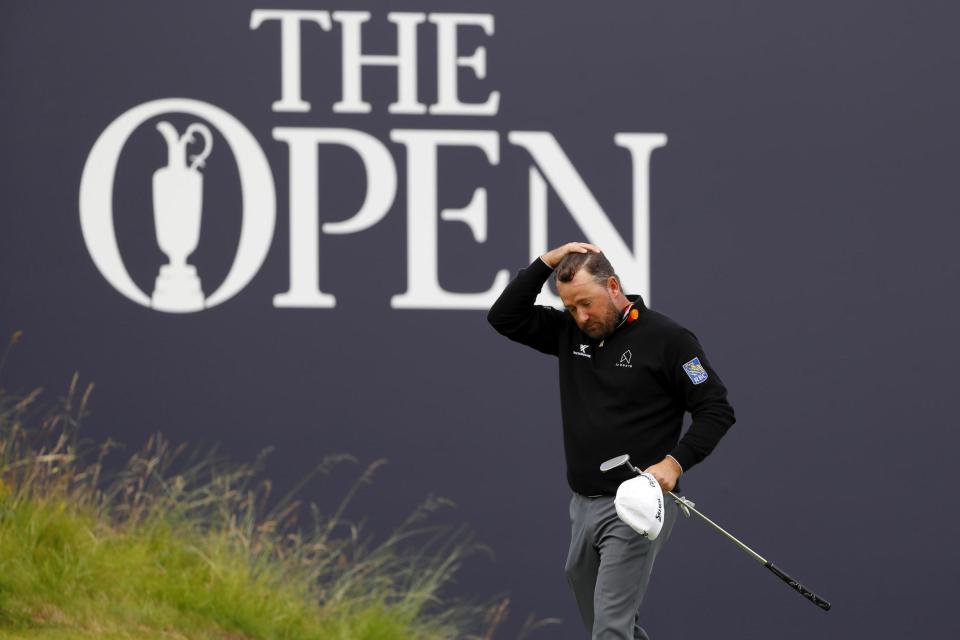 Graeme McDowell was left to curse a poor finish and one of golf's new rules after squandering a promising start to the 148th Open in his home town of Portrush.McDowell played the first 14 holes in three under par but then three-putted the 15th and 17th and ran up a triple-bogey seven on the 18th after losing his ball following a wayward drive.The former US Open champion's ball was found just seconds after his allotted search time had expired, that time having been reduced from five minutes to three minutes in January this year."I thought it was a hell of a rule there until about 12 minutes ago," McDowell said with a wry smile after signing for an opening 73."It's amazing, five minutes feels like a long time when you're looking for a ball. And three minutes feels like no time at all. We had 30 people over there looking for that thing. Twelve seconds after the three minutes was up we found it."Unfortunately it was 10 yards right of where I thought it was. For some reason no-one saw it and the marshals didn't get an eye on it."There's not a blade of rough on the golf course that looks like the stuff down the right of 18, potentially a little artificially done. But you shouldn't be over there in the first place. (I'm) gutted obviously. But it is what it is."I've got to not let this spoil my week, because it could easily spoil my week. I feel like all the air has been let out of the sails plus some. The ship feels like it's sinking."McDowell, who only qualified via a top-10 finish in the Canadian Open last month and said he would not have been able to bear being in Portrush if he was not playing, admitted it had been an emotional day as the Open returned to Northern Ireland for the first time since 1951."I did have a tear in the eye and I'm kind of embarrassed to say it," McDowell said. "It's just been a great journey. It's been an amazing journey to get here."People have been amazing and the receptions out there were really a lot of fun. And to be honest, as soon as I got off the first, I felt very relaxed."But the first tee was definitely a little emotional and a little intimidating. I was happy to get that away."
