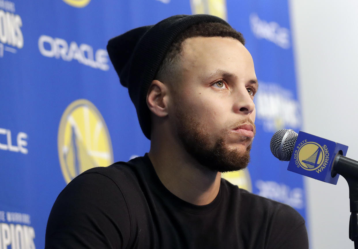 Stephen Curry could be looking at an early May return from his MCL injury. (AP Photo)
