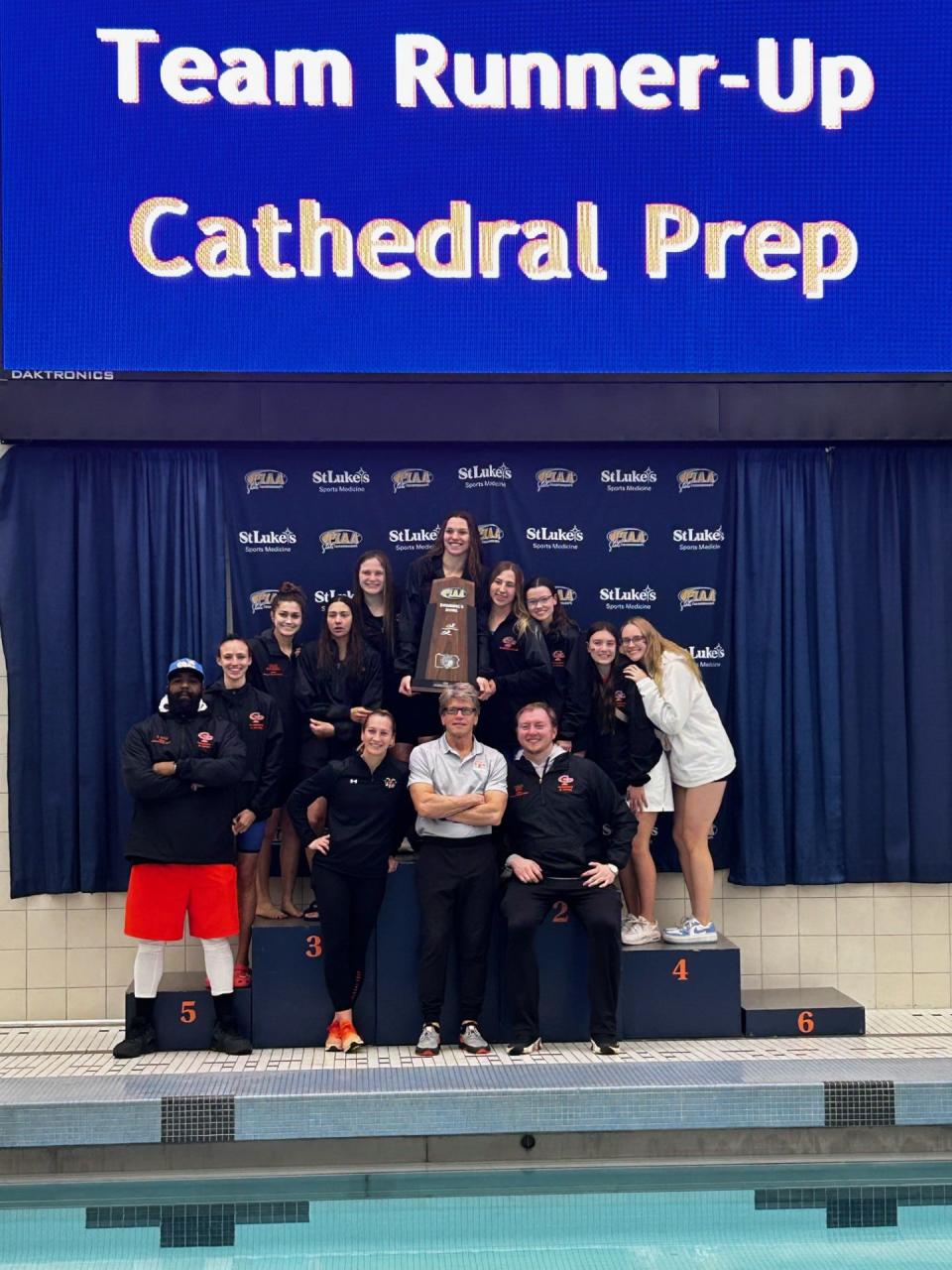 The Cathedral Prep Ramblers, coached by Sonya Whitman (standing, orange shoes), finished second in the team standings for this weekend's PIAA Class 2A girls swimming and diving meet at Bucknell University in Lewisburg. Prep totaled 145 points to Mt. Pleasant's 164.