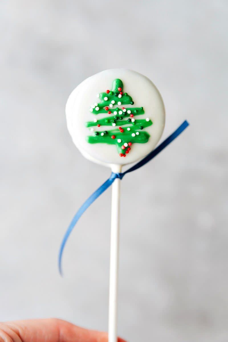 <p>No need to go overboard decorating these dainty pops—a little icing and sprinkles will do just fine.</p><p><strong>Get the recipe at <a href="https://www.chelseasmessyapron.com/christmas-oreo-pops-2/" rel="nofollow noopener" target="_blank" data-ylk="slk:Chelsea's Messy Apron;elm:context_link;itc:0;sec:content-canvas" class="link ">Chelsea's Messy Apron</a>.</strong> </p>