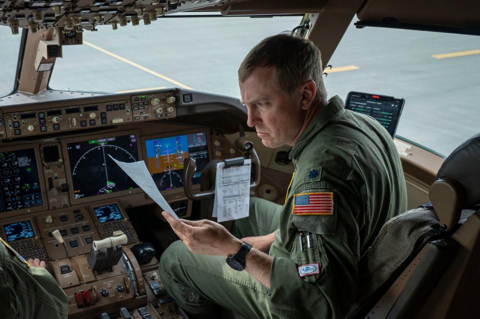 U.S. Air Force Lt. Col. Gregg Van Splunder, commander of the 260th Air Traffic Control Squadron, Pease Air Force Base, NH, executes preflight procedures during RED FLAG-Alaska 23-3 at Joint Base Elmendorf-Richardson, Alaska, August 15, 2023. <em>U.S. Air Force photo by Airman 1st Class Andrew Britten</em>