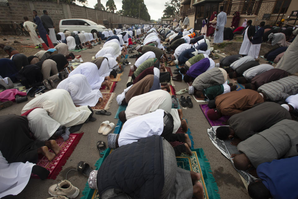 Muslims gather for prayers to celebrate Eid al-Adha, or Feast of Sacrifice, that commemorates the Prophet Ibrahim's faith in Nairobi, Kenya, Tuesday, July 20, 2021. Eid al-Adha marks the end of hajj. (AP Photo/Sayyid Abdul Azim)