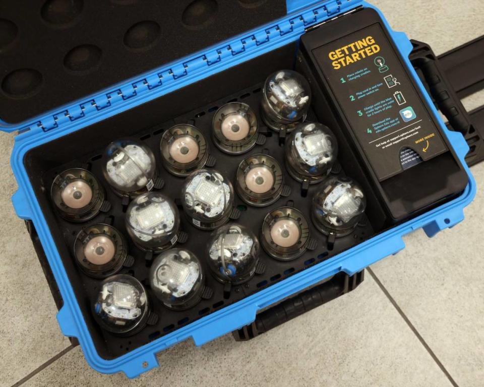 Small ball-like robots are stored in the case waiting to be programmed by students as part of the Fab Lab launched at the Phichol Williams Community Center in Homestead, Florida on Wednesday, Jan. 17, 2024.