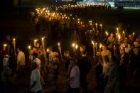 <p>Neo-Nazis, Alt-Right, and White Supremacists march through the University of Virginia Campus with torches in Charlottesville, Va., on Aug. 11, 2017. (Photo: Samuel Corum/Anadolu Agency/Getty Images) </p>