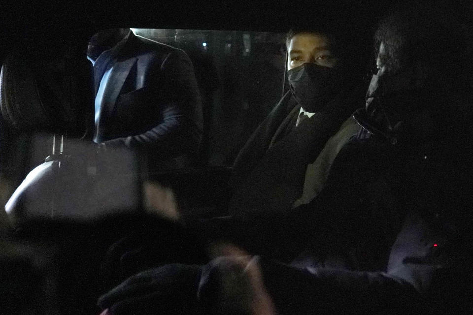 Actor Jussie Smollett sits in the back of a vehicle as he leaves the Leighton Criminal Courthouse, Thursday, Dec. 9, 2021, in Chicago, following a verdict in his trial. Smollett was convicted Thursday on five of six charges he staged an anti-gay, racist attack on himself nearly three years ago and then lied to Chicago police about it. (AP Photo/Nam Y. Huh)