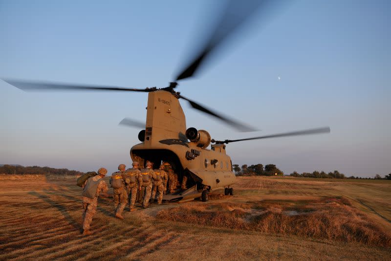 Members of South Korea and U.S. Special forces get on a CH-47 Chinook during a joint military exercise conducted by South Korean and U.S. special forces troops in Gangwon province