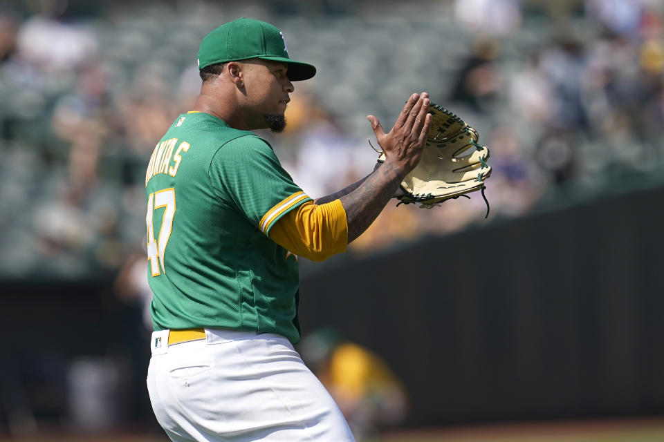 Oakland Athletics pitcher Frankie Montas reacts after New York Yankees' Joey Gallo hit into a double play during the seventh inning of a baseball game in Oakland, Calif., Saturday, Aug. 28, 2021. (AP Photo/Jeff Chiu)