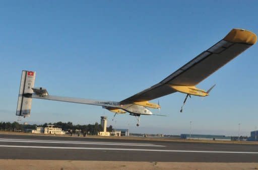 Solar-powered aircraft the Solar Impulse, piloted by Bertrand Piccard of Switzerland, takes off from Rabat on June 21 for a voyage across the Moroccan desert, to Ouarzazate. The Swiss-made plane early Friday completed a flight over the Moroccan desert to showcase renewable energy, as a key summit in Rio discussed "greening" the world economy