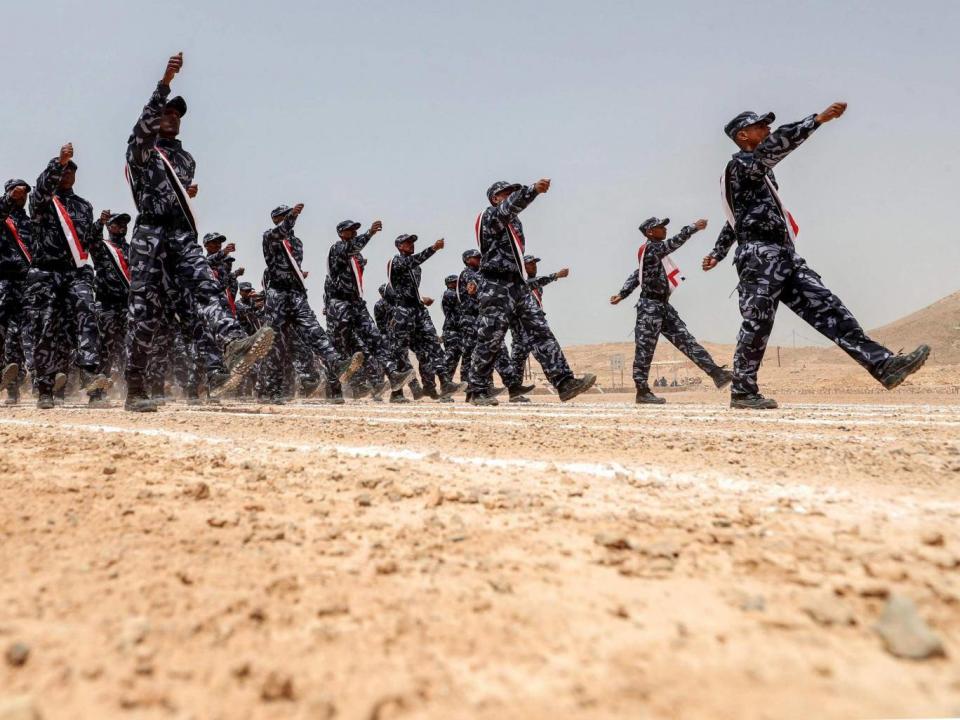 UAE-trained cadets of the Yemeni police marching during their graduation in the southeastern port city of Mukalla (AFP/Getty)
