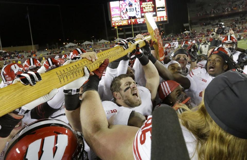 The winner of the Wisconsin-Minnesota game will also hoist Paul Bunyan’s Axe. (AP)