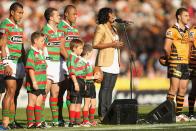 <p>In 2008 Paulini left Young Divas to return to her solo career - pictured performing at a NRL game in 2009.</p>