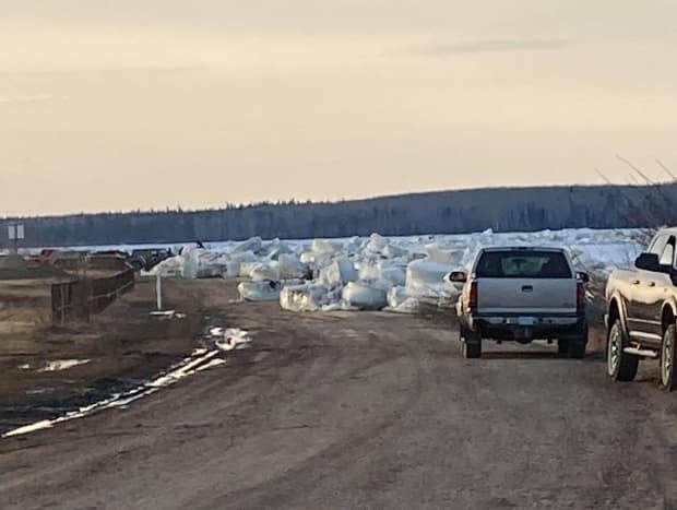 The swell of water and ice has blocked some roads in Fort Simpson.