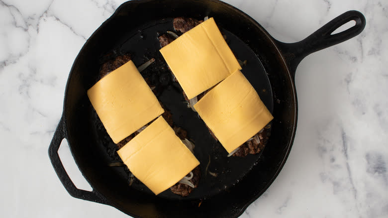 Beef and cheese in skillet