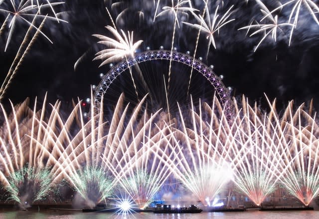 Fireworks light up the sky over the London Eye