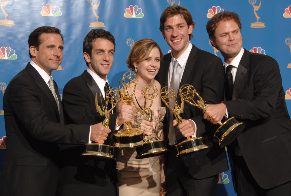 The Office cast members Steve, John, Rainn,  Jenna Fischer, and BJ Novak holding Emmys