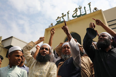 Muslims shout slogans as they condemn the Christchurch mosque attack in New Zealand, after Friday prayers at the Baitul Mukarram National Mosque in Dhaka, Bangladesh, March 15, 2019. REUTERS/Mohammad Ponir Hossain